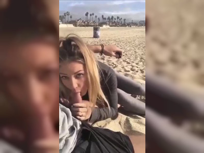 Il se fait sucer sur la plage